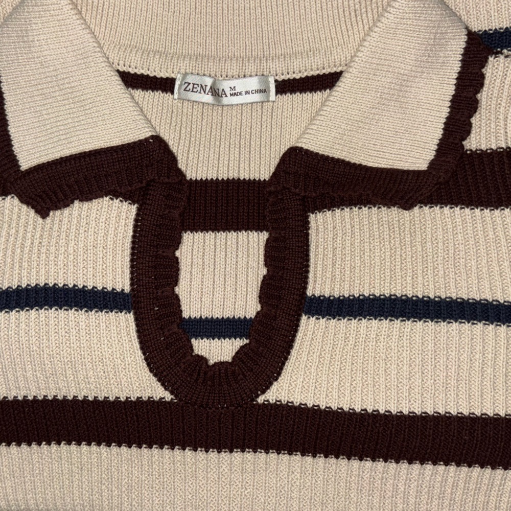 NWOT STILL IN PLASTIC. Adorable cream,brown,blue